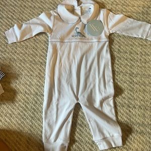 Brand new with tags. Little English dinosaur playsuit. 6-12 months.
